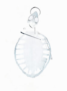 A delicate, minimalist outline of a circular shape takes center stage with white space enhancing its structure. The form suggests ethereal fragility, intersected by lines and arcs that hint at intricate, organic patterns. The soft, pale blue hue adds a sense of calmness and serenity, while subtle shading provides depth and dimensionality, creating an abstract, airy composition.